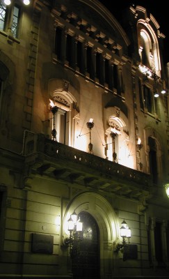 Flaming torches at building entrance